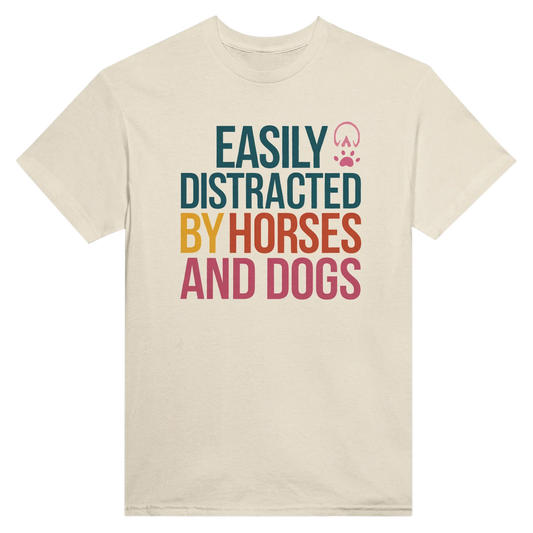 Easily Distracted By Horses and Dogs T-Shirt with colorful text and paw and hoof prints on beige cotton fabric