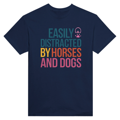 Navy blue Easily Distracted By Horses and Dogs T-shirt with colorful text and pink hoof and paw prints, made of heavyweight cotton with a classic fit.