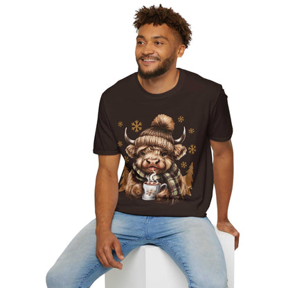 Unisex black t-shirt featuring watercolor Highland Cow with knit hat, plaid scarf, hot chocolate mug, and snowflakes design