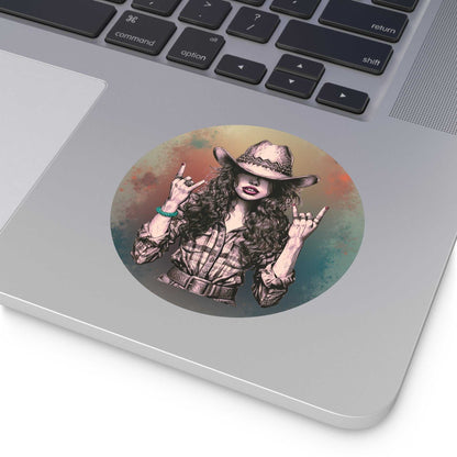 Rock On Vintage Cowgirl sticker featuring a sassy cowgirl with a hat and rock-and-roll hand signs on a laptop.