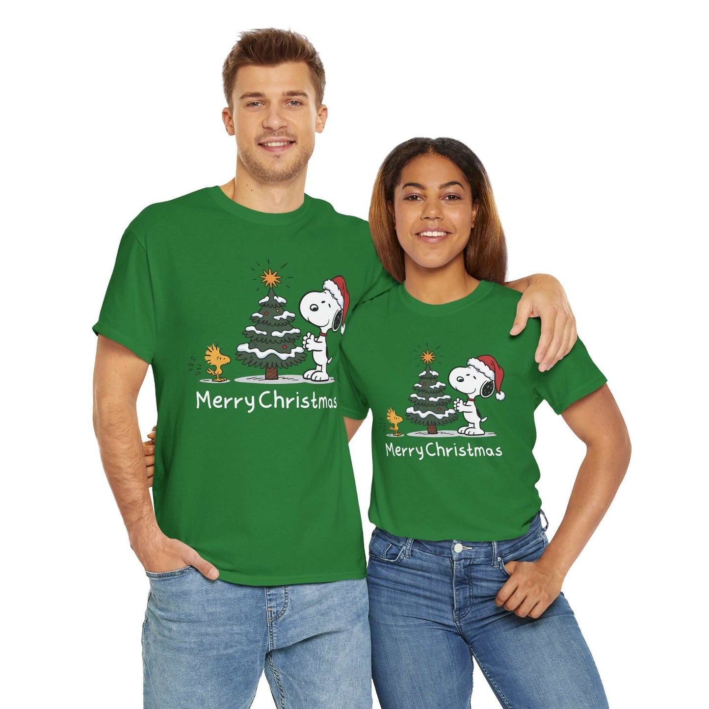 Couple wearing green Snoopy & Woodstock Merry Christmas t-shirts with festive holiday design