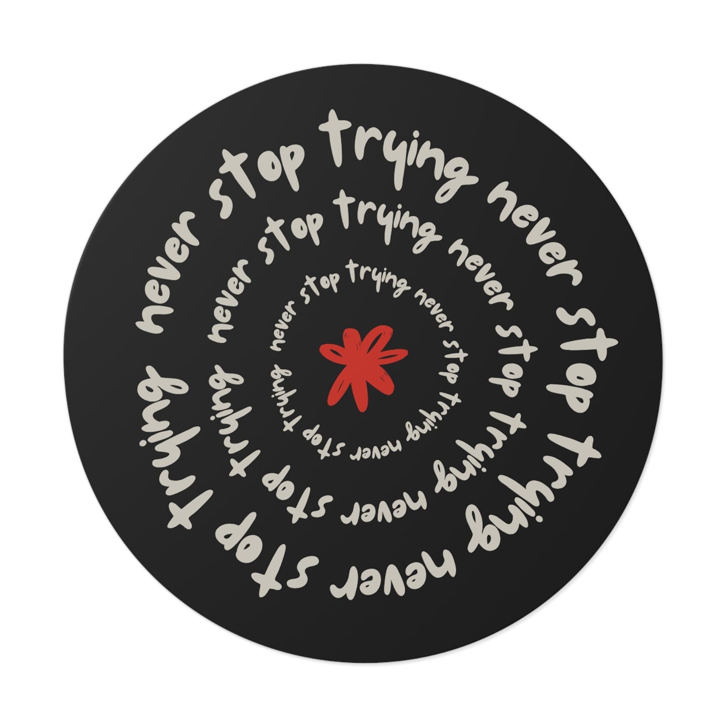 Don't Stop Trying round vinyl sticker with motivational spiral text and red star design on black background