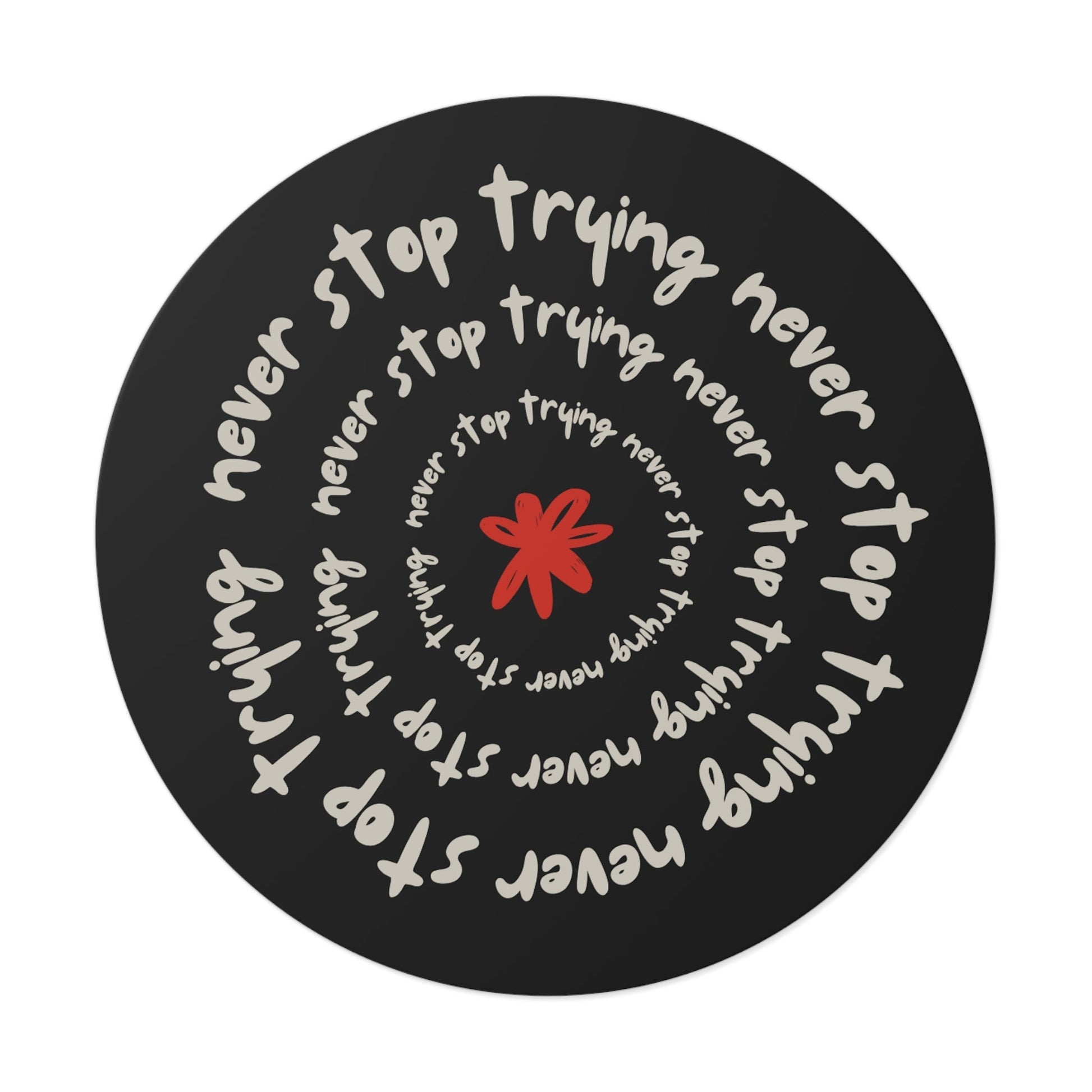 Don't Stop Trying round vinyl sticker with motivational spiral text and red star design on black background