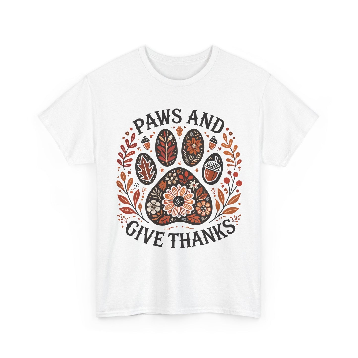 White t-shirt with autumn-themed paw print and "Paws and Give Thanks" text design