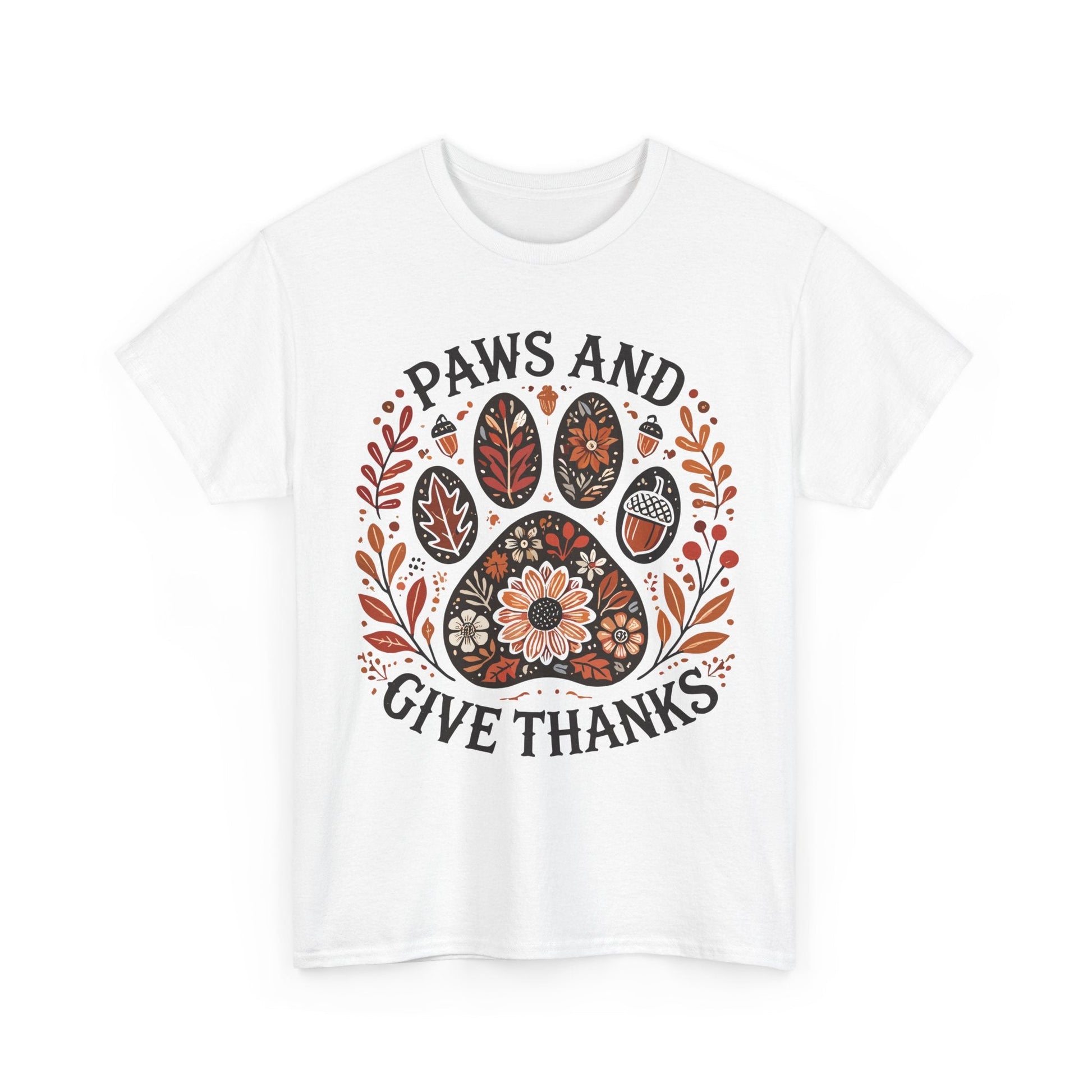White t-shirt with autumn-themed paw print and "Paws and Give Thanks" text design