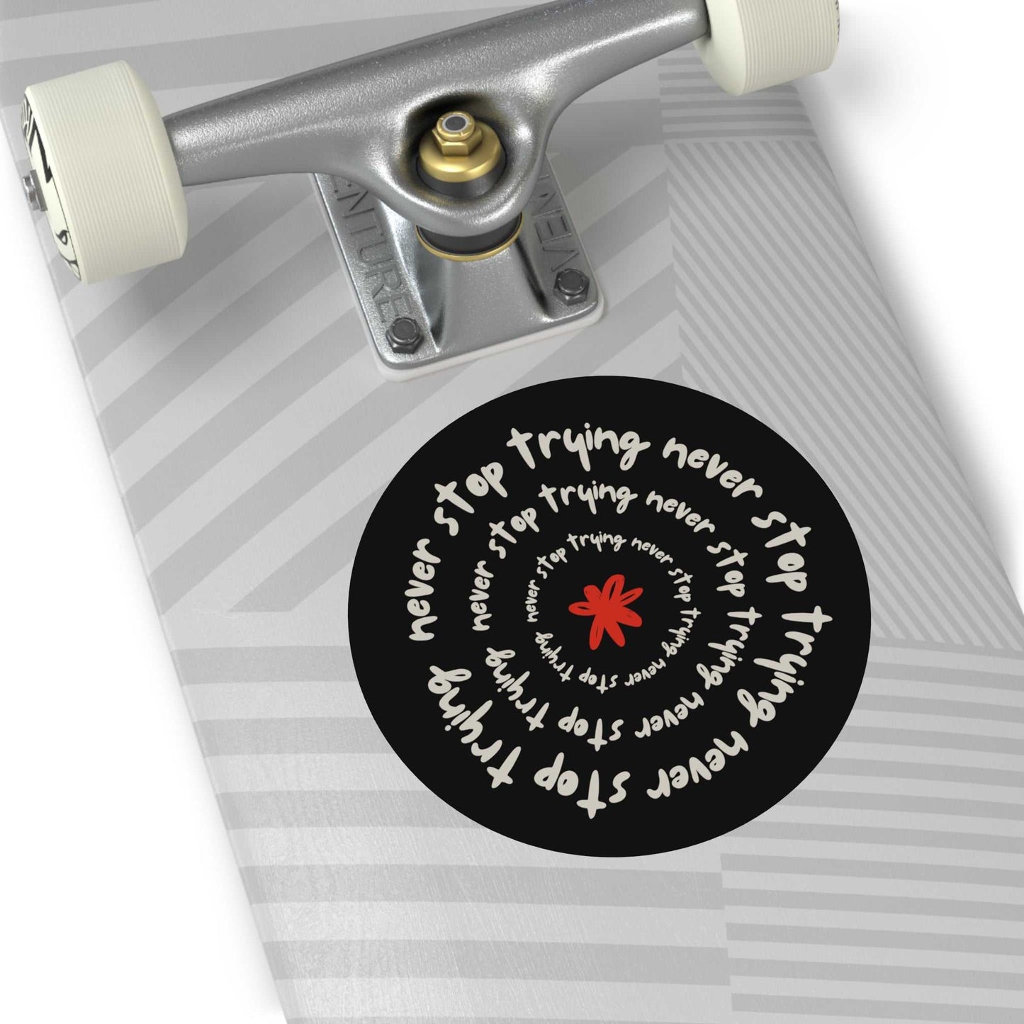 Don't Stop Trying motivational round vinyl sticker on skateboard deck