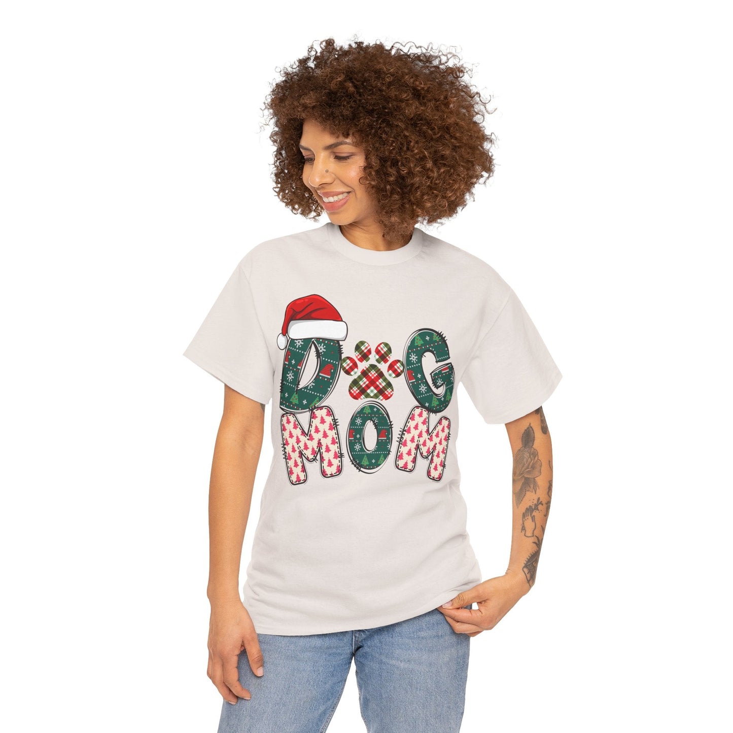 Woman wearing white Christmas Dog Mom Tee with festive text and Santa hat design