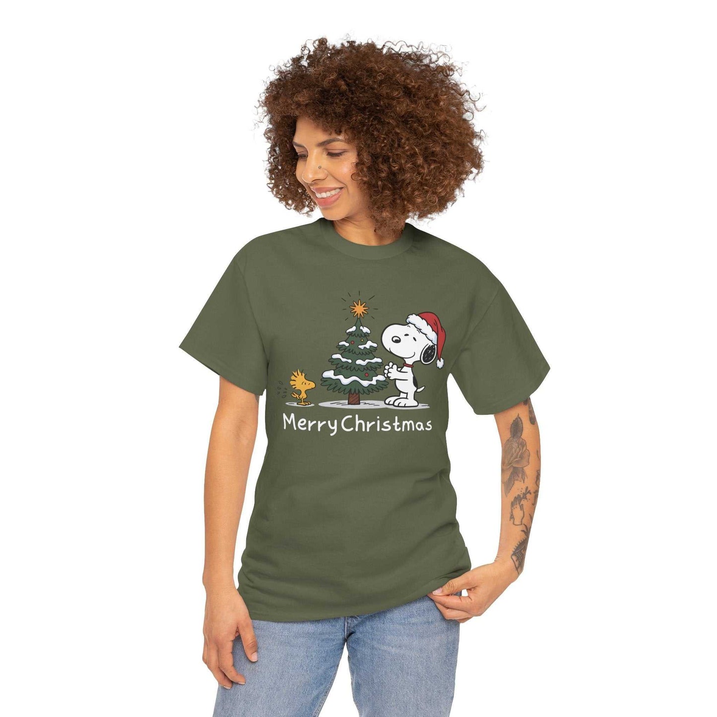 Woman wearing green Snoopy and Woodstock Merry Christmas t-shirt with festive holiday graphic