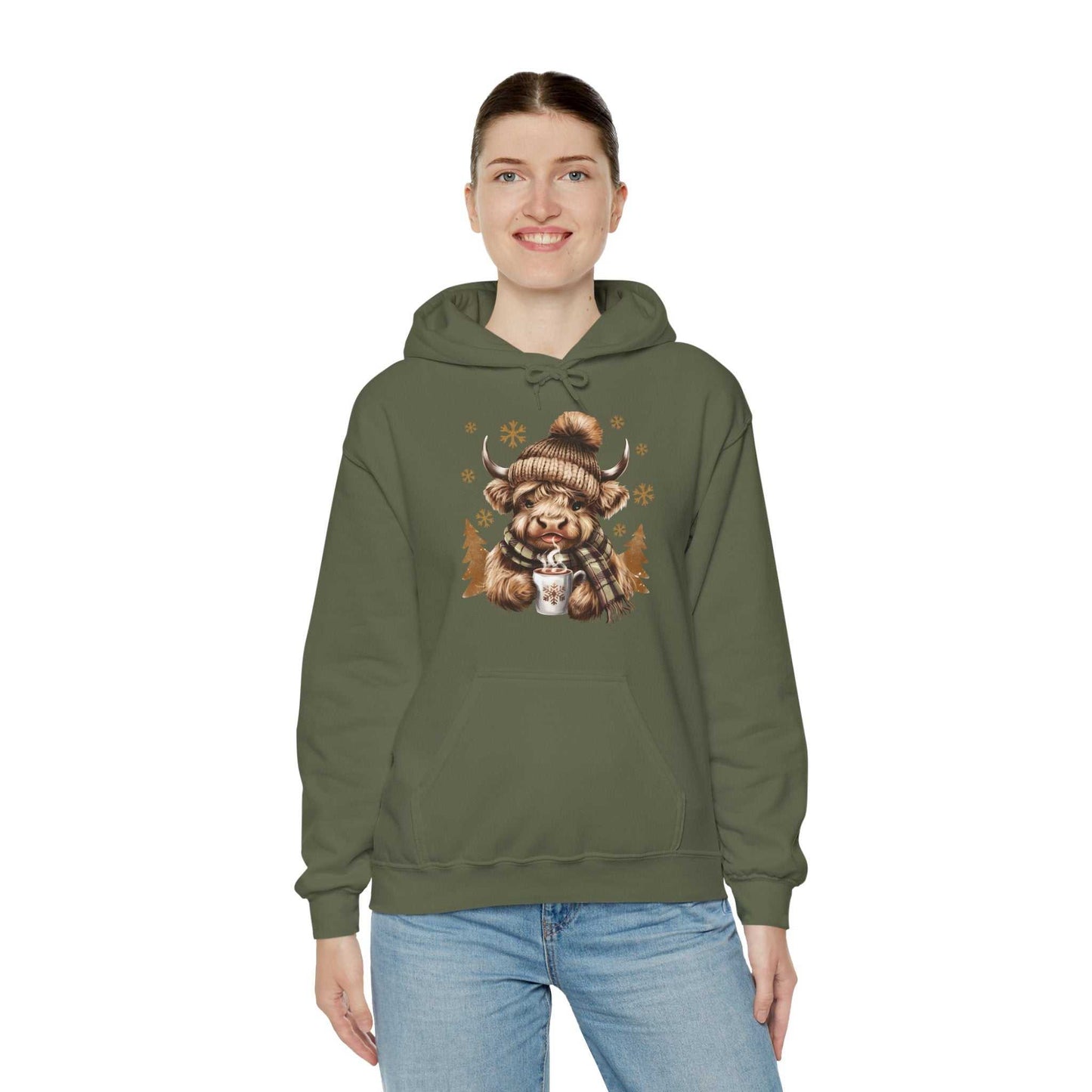 Green Highland Cow Hoodie with cozy winter cow illustration holding hot chocolate, unisex winter sweatshirt.
