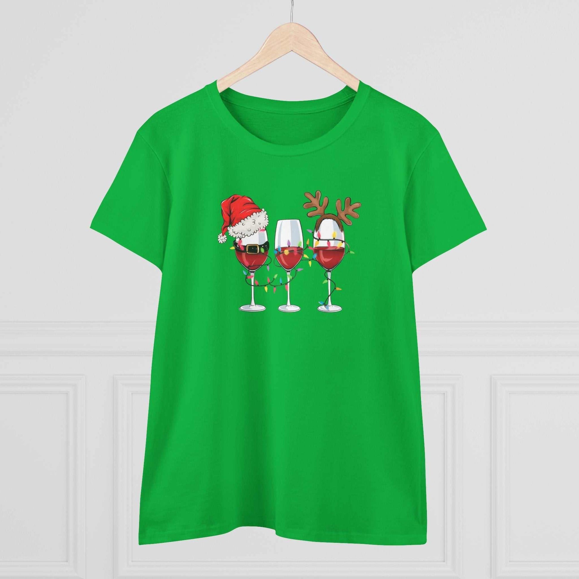 Green Wine Glasses Christmas T-Shirt with three festive wine glasses decorated with Santa hat, Christmas lights, and reindeer antlers design