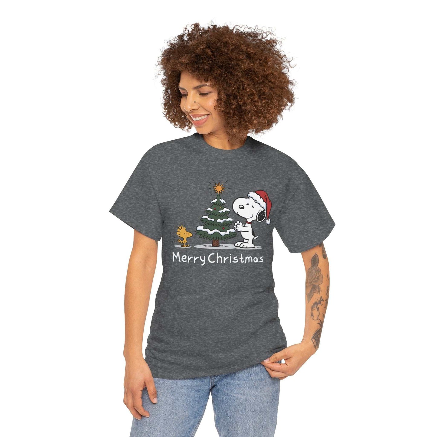 Woman wearing gray Snoopy & Woodstock Merry Christmas T-shirt with Snoopy in Santa hat and Christmas tree graphic