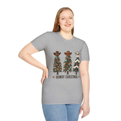 Woman wearing a grey Howdy Christmas Cowboy Tree T-Shirt with three decorated Christmas trees topped with cowboy hats and "Howdy Christmas" text.