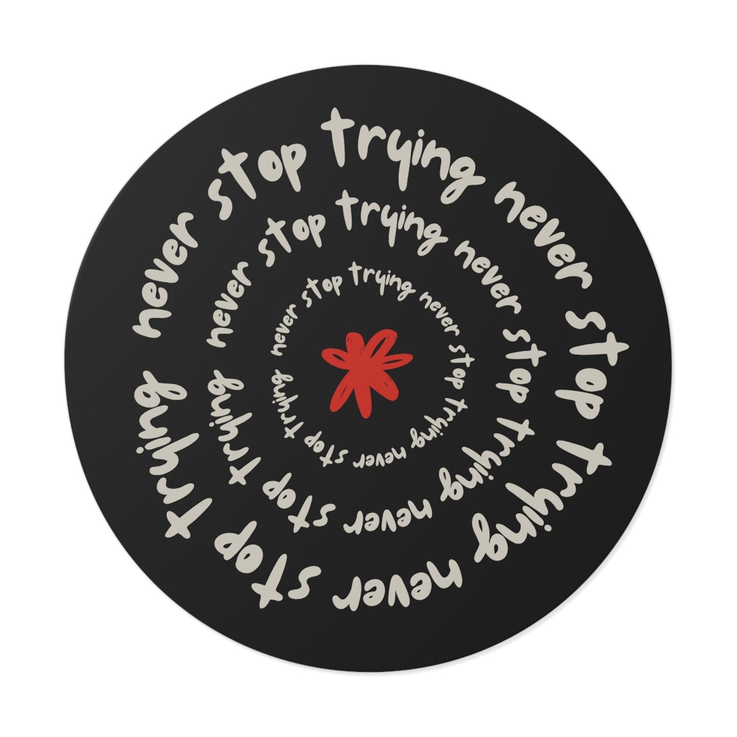 Don't Stop Trying round vinyl sticker with motivational text spiral design and red star center on black background