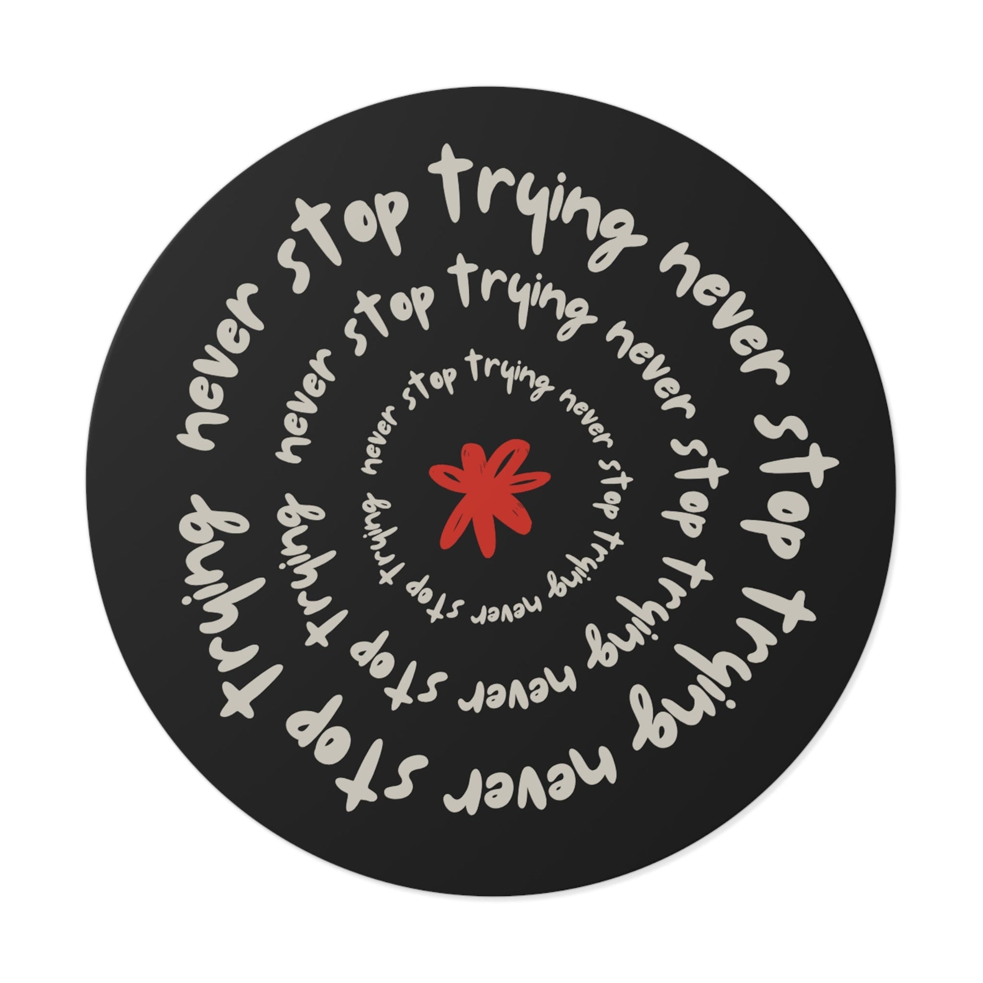 Don't Stop Trying round vinyl sticker with motivational text spiral design and red star center on black background