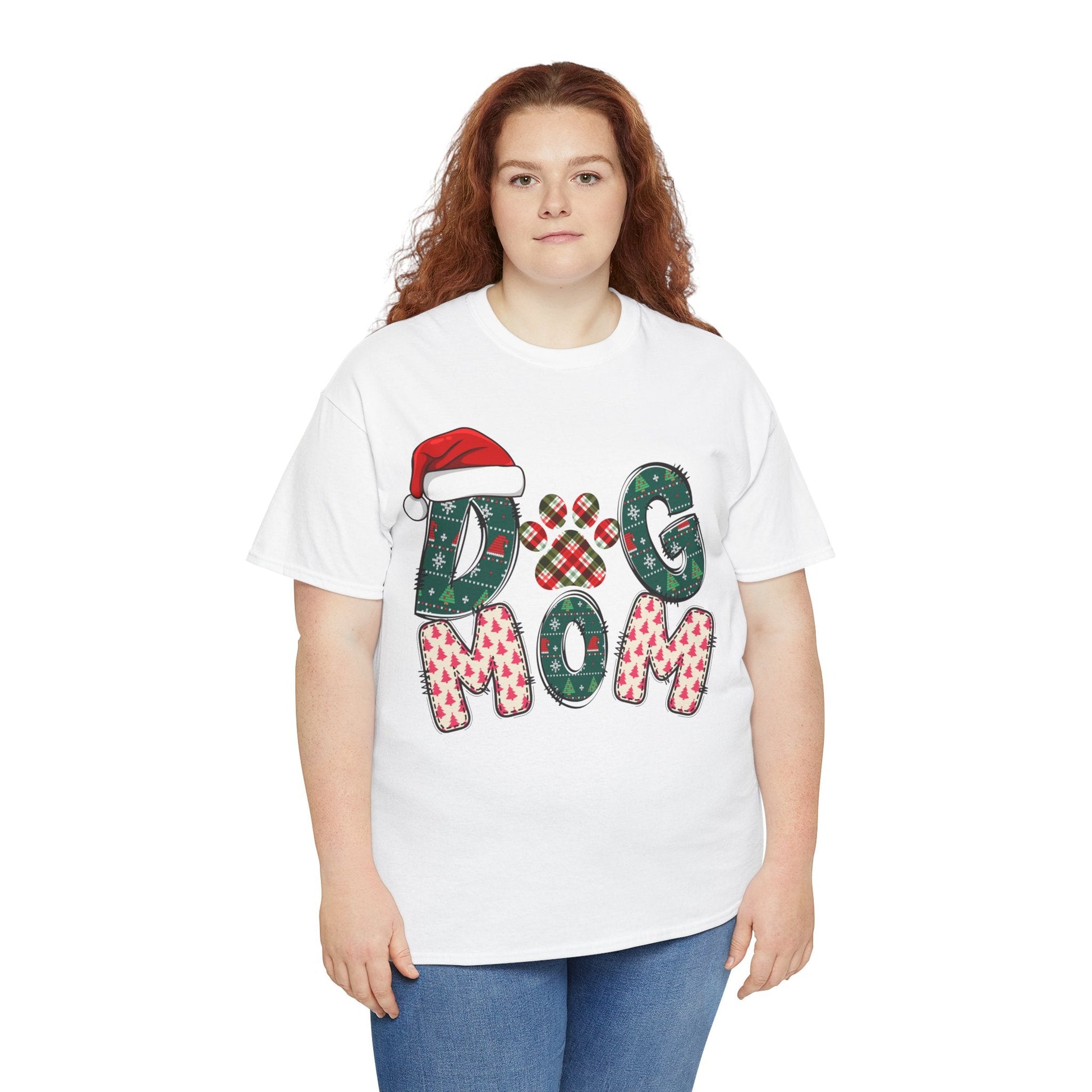 Woman wearing white Christmas Dog Mom Tee with festive dog-themed lettering and Santa hat design