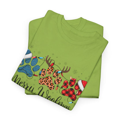 Green "Merry Woofmas" Christmas tee with festive paw prints in buffalo plaid, leopard spots, Santa hats, and antlers design