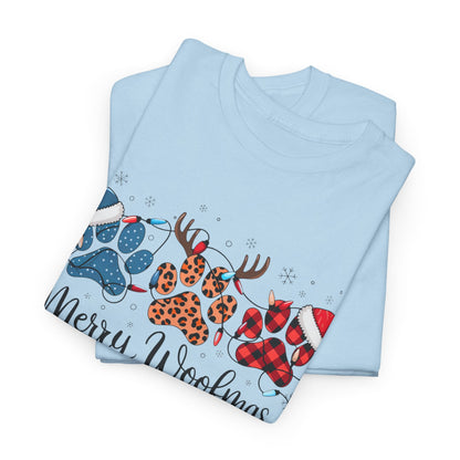 Light blue "Merry Woofmas" Christmas tee featuring festive paw prints with buffalo plaid, leopard spots, Santa hats, antlers, and Christmas lights.