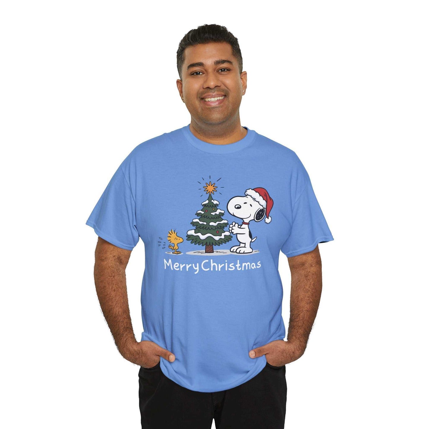 Man wearing blue Snoopy & Woodstock Merry Christmas holiday t-shirt with Santa hat and Christmas tree design