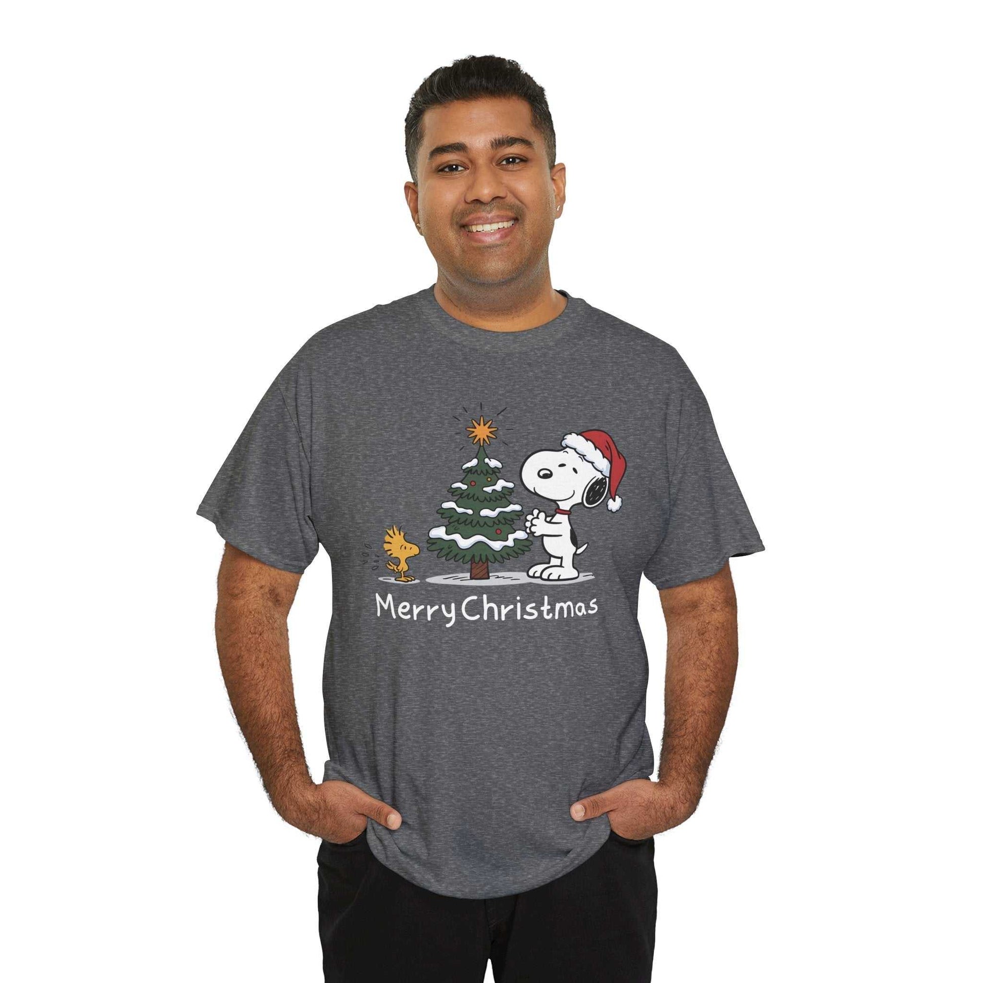 Man wearing gray Snoopy & Woodstock Merry Christmas T-shirt with Snoopy in Santa hat and decorated Christmas tree design