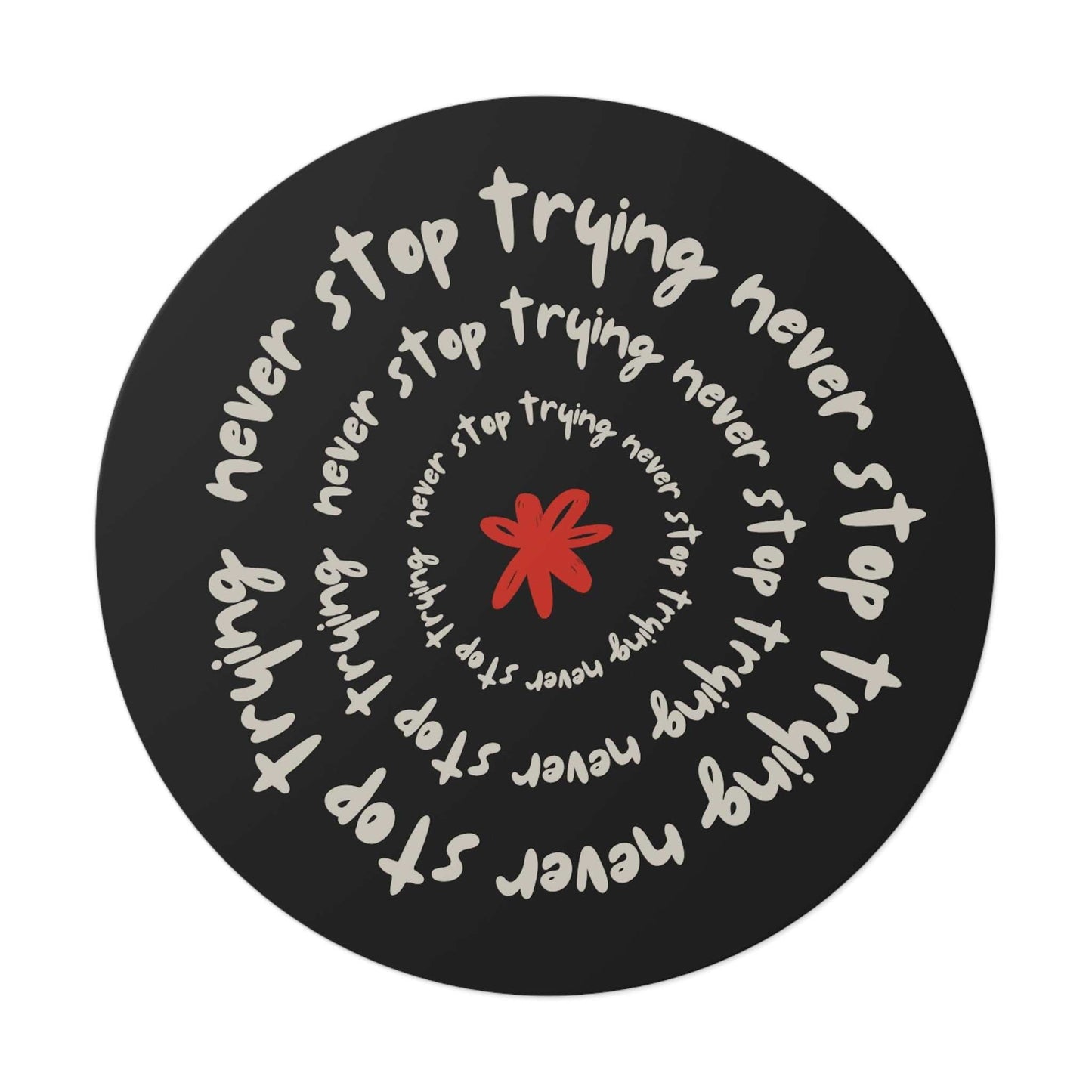 Don't Stop Trying motivational round vinyl sticker with spiral text and red star on black background