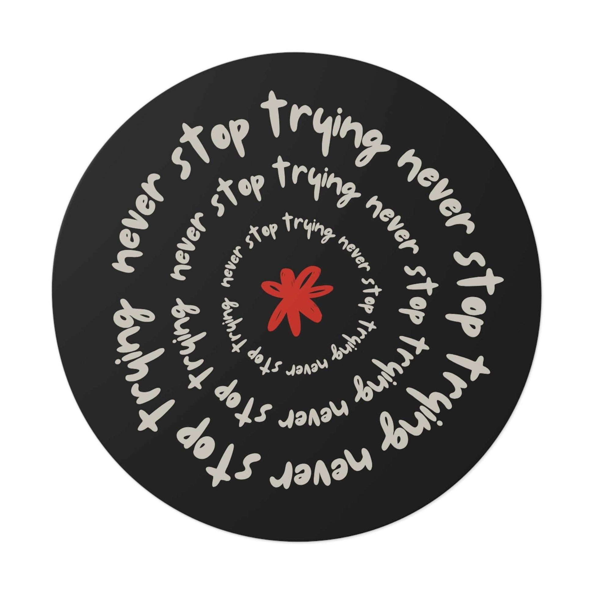 Don't Stop Trying motivational round vinyl sticker with spiral text and red star on black background