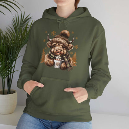 Olive green Highland Cow Hoodie with winter hat, plaid scarf, and hot chocolate design, cozy unisex fit.
