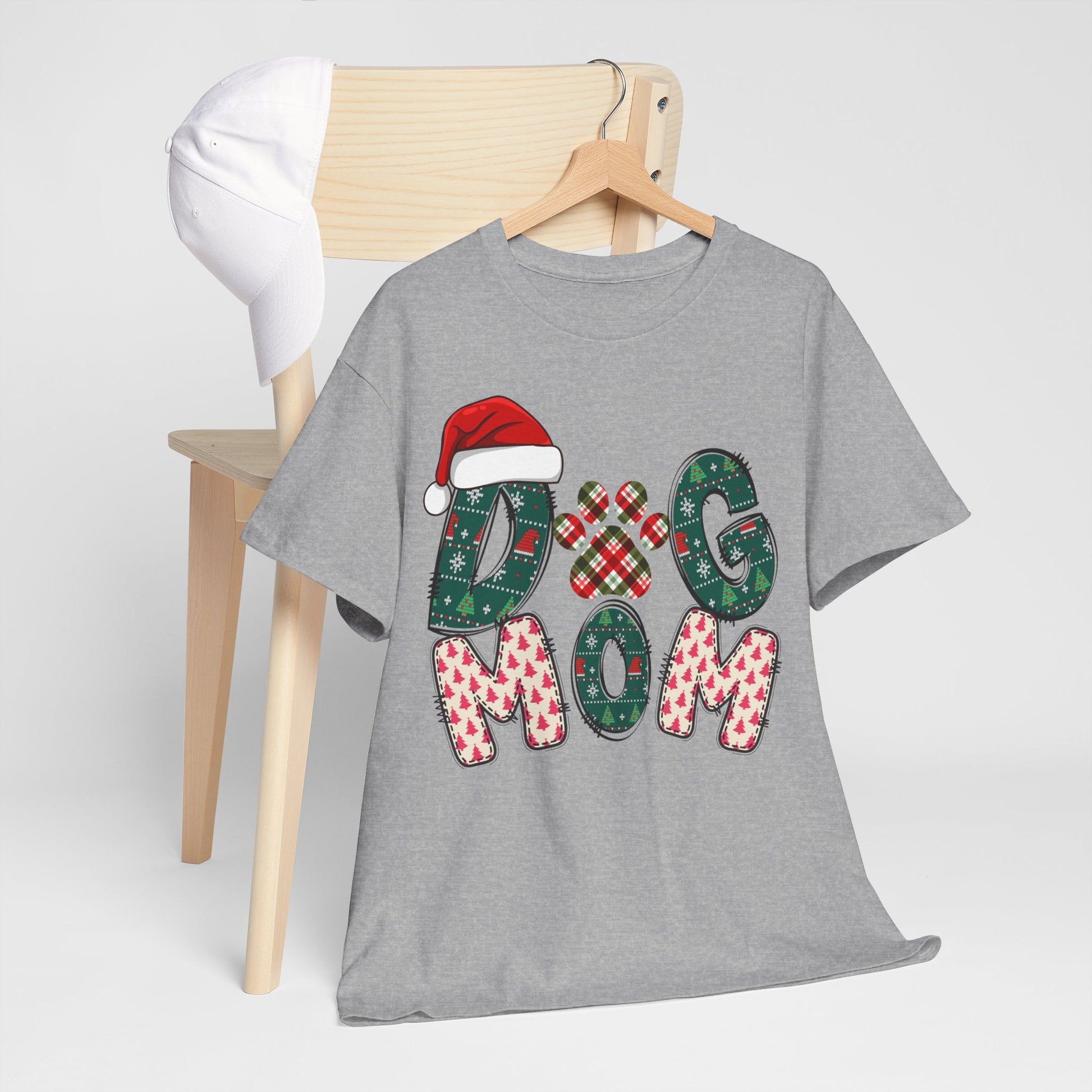 Gray Christmas Dog Mom Tee with festive patterned letters and Santa hat design, cozy unisex cotton shirt for dog lovers