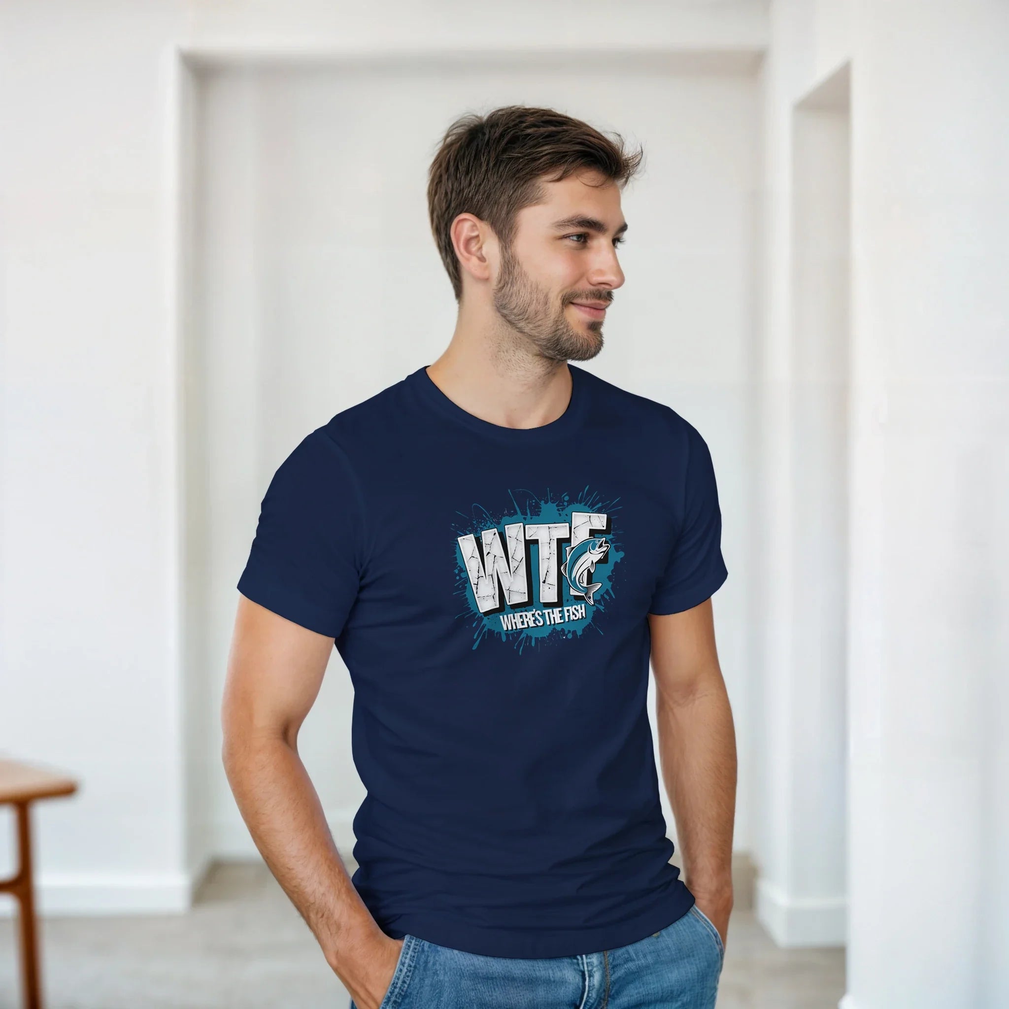 Man wearing WTF Where's The Fish whimsical fishing t-shirt in navy blue with classic cotton fit