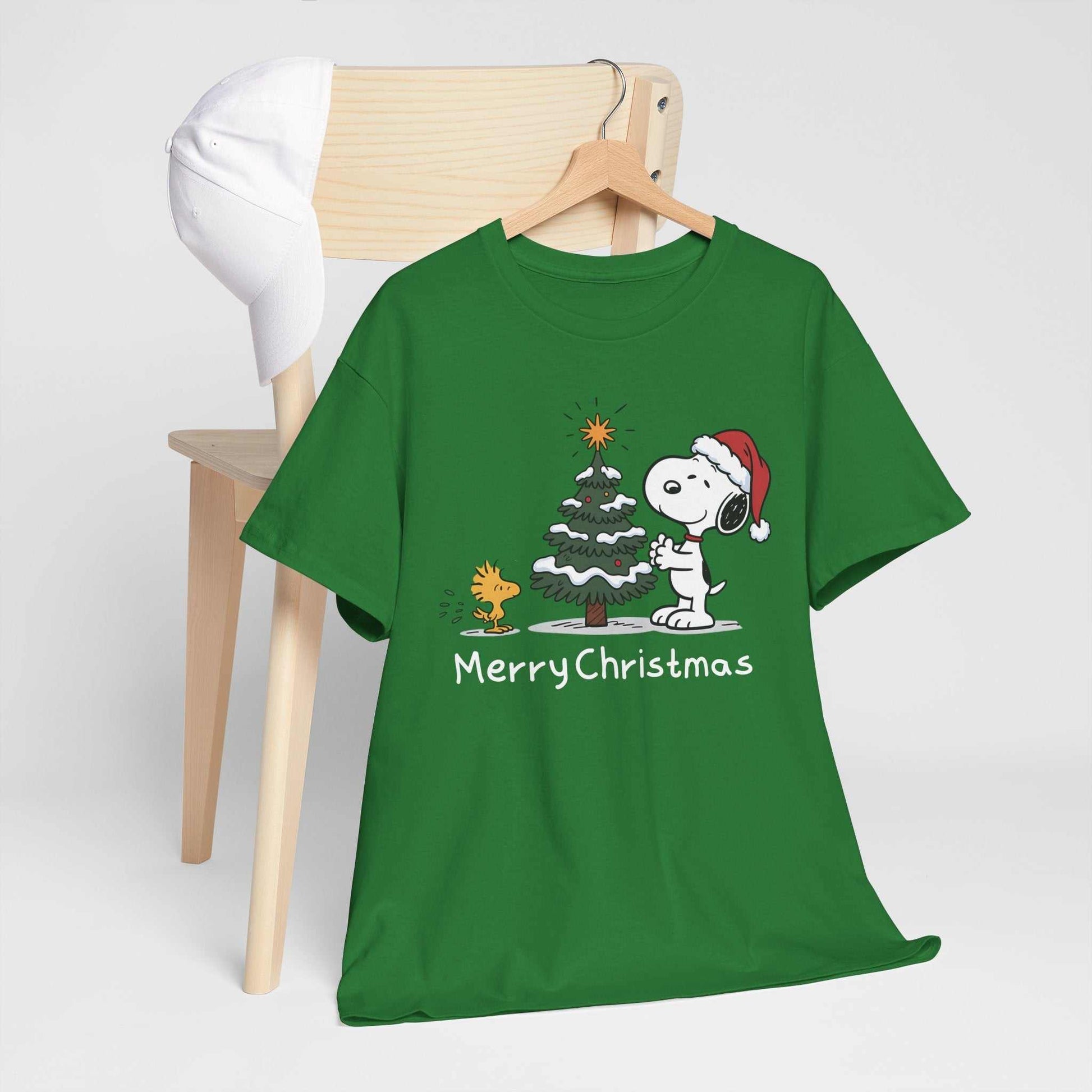 Green Snoopy & Woodstock Merry Christmas T-shirt with Snoopy in Santa hat and decorated Christmas tree graphic