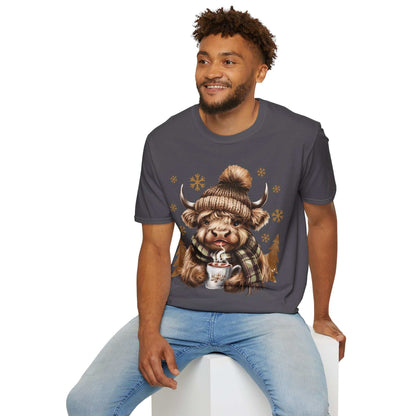 Man wearing grey Highland Cow winter-themed t-shirt with cozy hat and hot chocolate illustration
