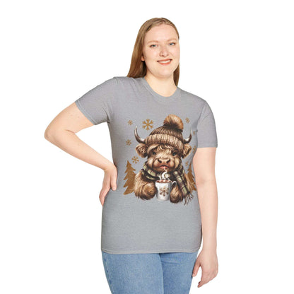Woman wearing a gray Highland Cow t-shirt with a winter hat, scarf, and hot chocolate design