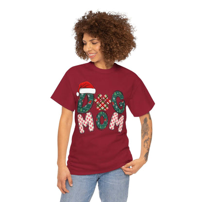 Woman wearing a red Christmas Dog Mom Tee with festive holiday design and Santa hat detail.
