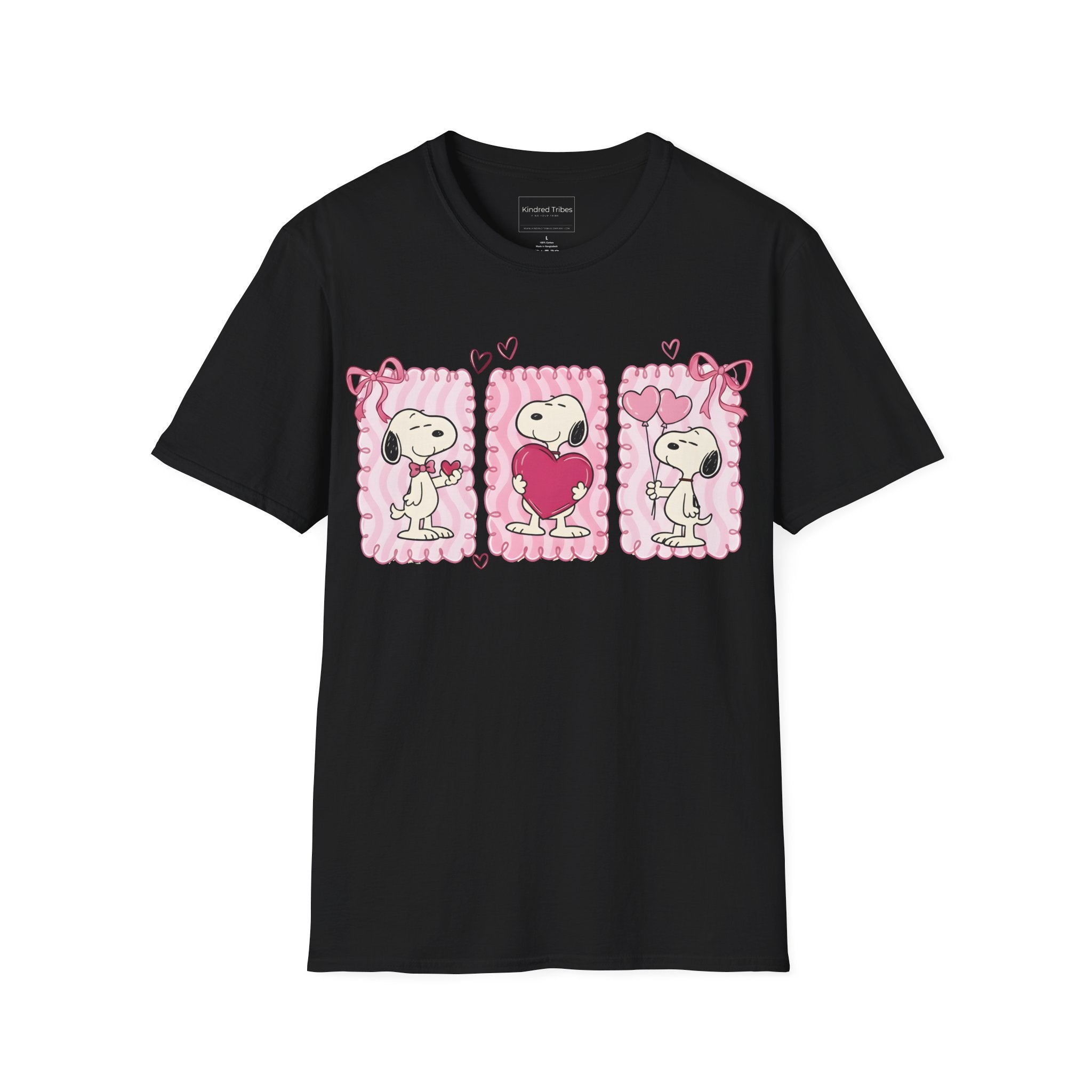 Black T-shirt with three distinct panels of Snoopy—sharing a small heart, hugging a giant one, and holding heart-shaped balloons—this tee is a playful celebration of friendship, affection, and the "Puppy Love" spirit.