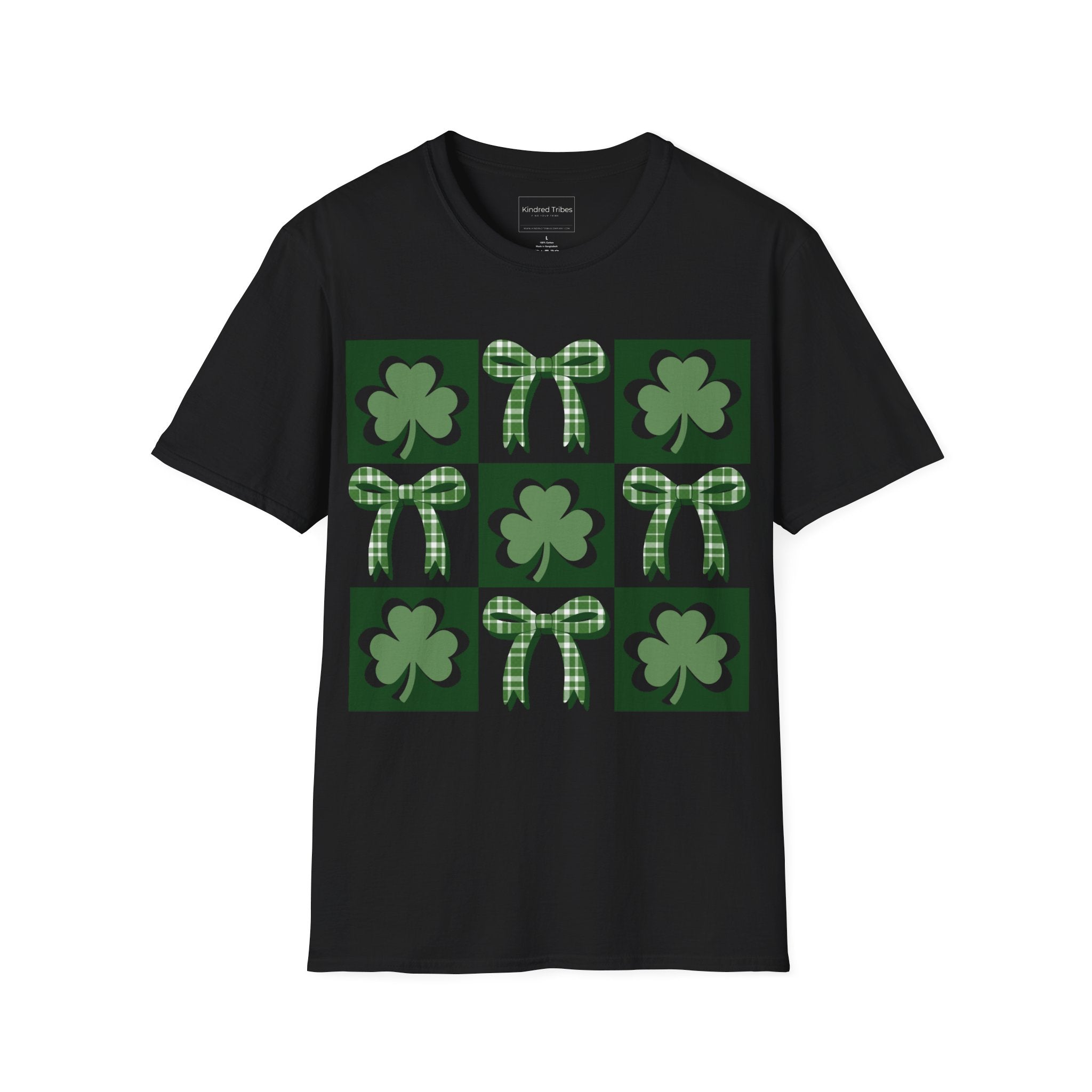 A Black Lucky Coquette t-shirt featuring a 3x3 square grid graphic. The grid alternates between squares with a solid dark green background containing a lighter green shamrock and squares containing a green-and-white checkered bow. The design is modern, symmetrical, and preppy in style