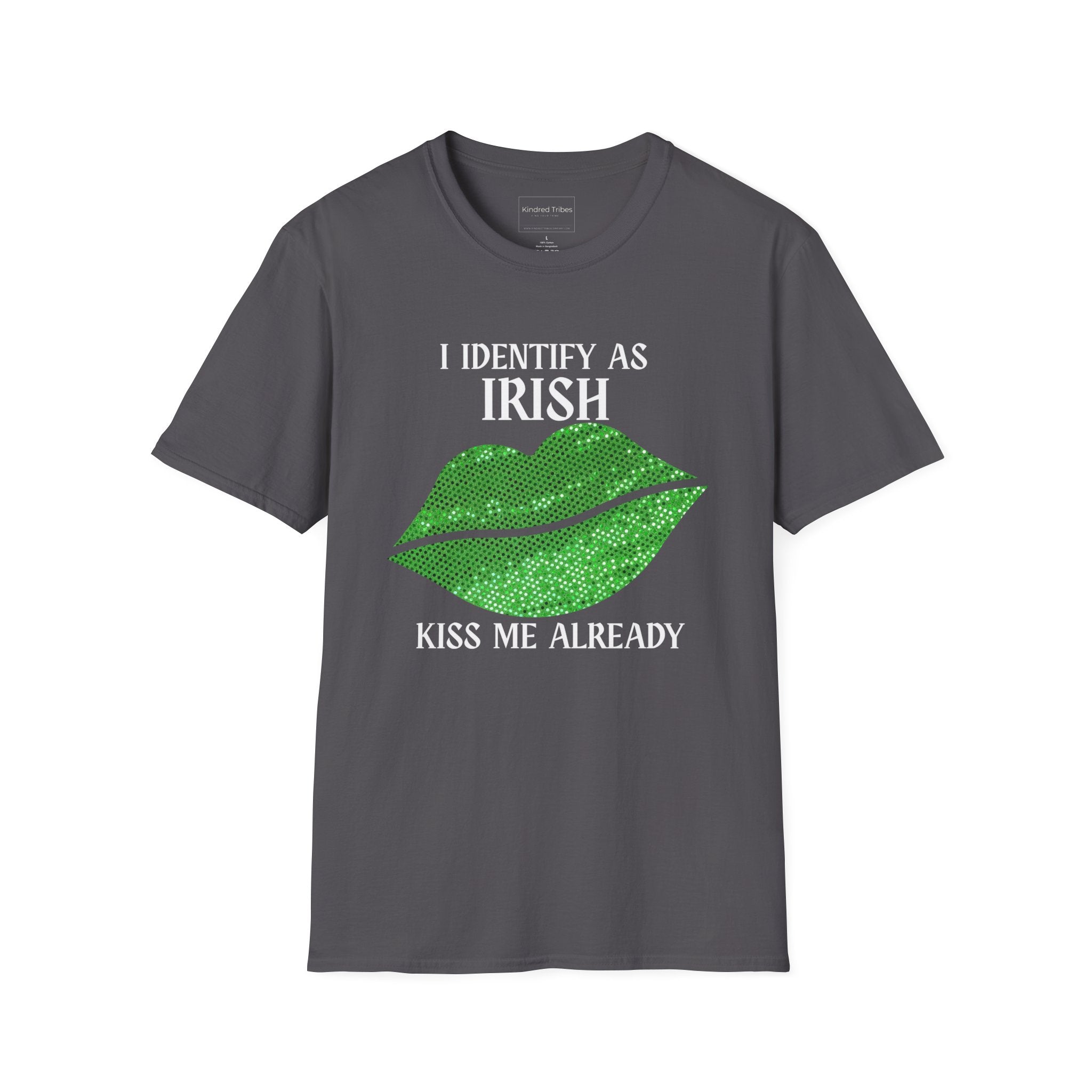 A dark grey Identify As Irish T-Shirt featuring the text 'I IDENTIFY AS IRISH' in bold white celtic letters at the top. Below the text is a large pair of lips filled with a sparkling, vibrant green sequin-effect pattern. At the bottom, the phrase 'KISS ME ALREADY' is printed in a matching white font. 
