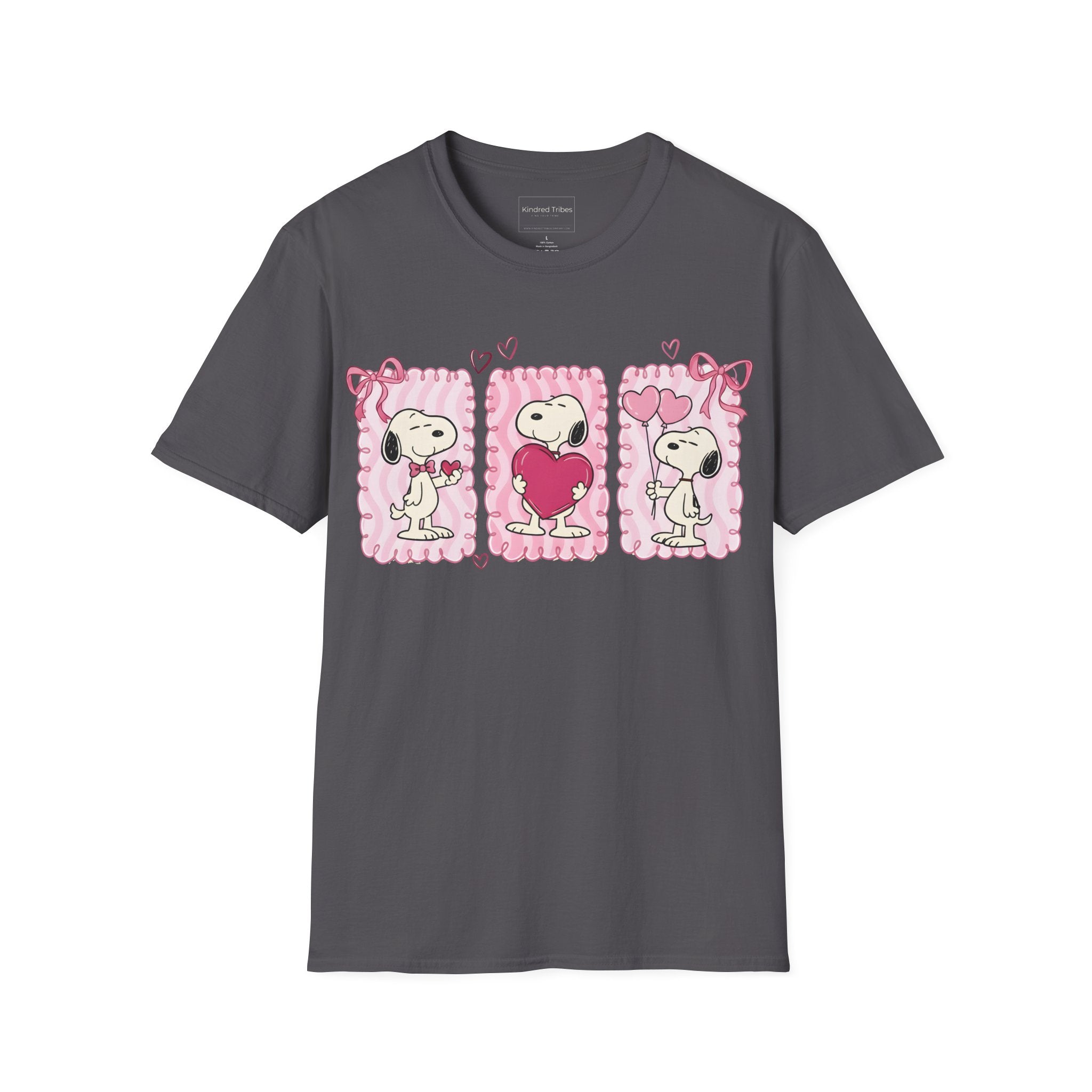 Charcoal Grey T-shirt with three distinct panels of Snoopy—sharing a small heart, hugging a giant one, and holding heart-shaped balloons—this tee is a playful celebration of friendship, affection, and the "Puppy Love" spirit.