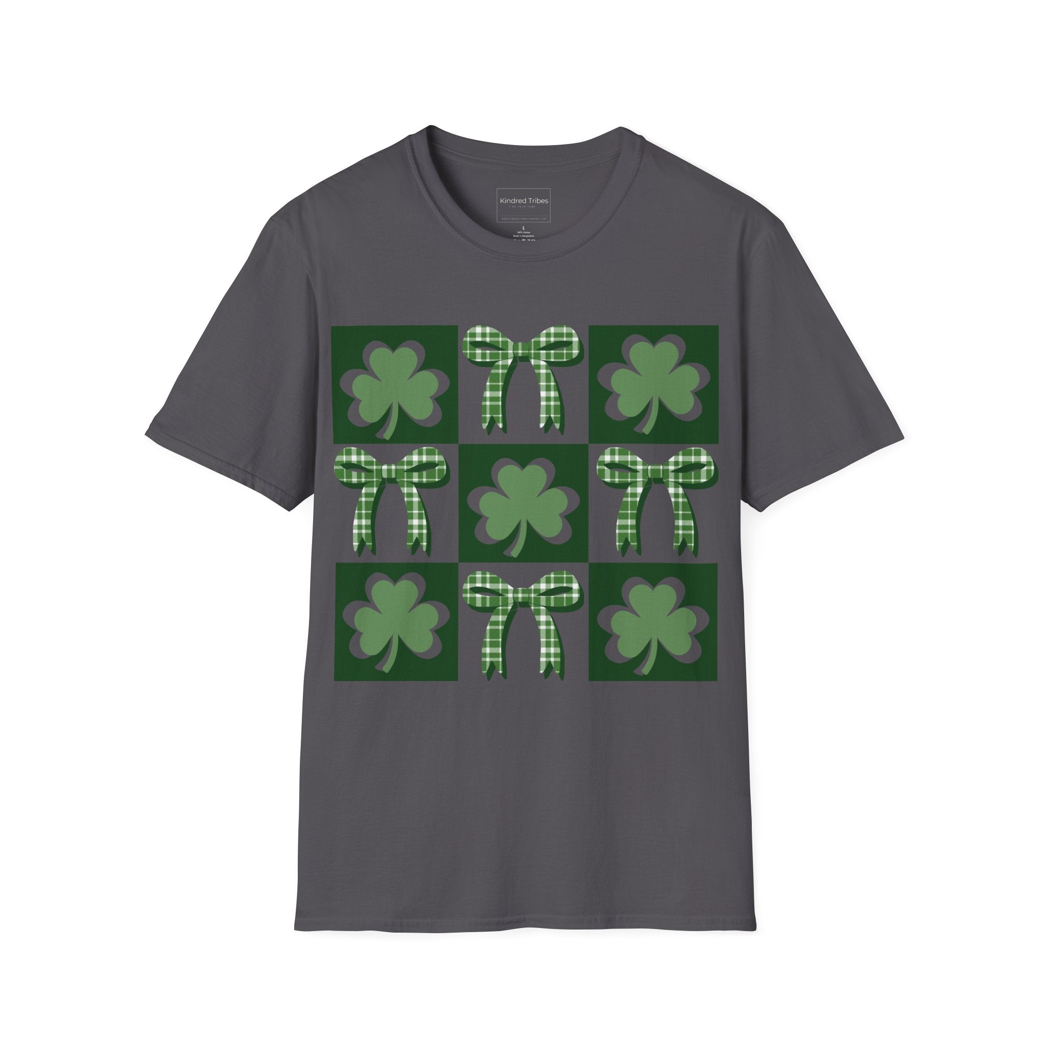 A Charcoal Grey Lucky Coquette t-shirt featuring a 3x3 square grid graphic. The grid alternates between squares with a solid dark green background containing a lighter green shamrock and squares containing a green-and-white checkered bow. The design is modern, symmetrical, and preppy in style