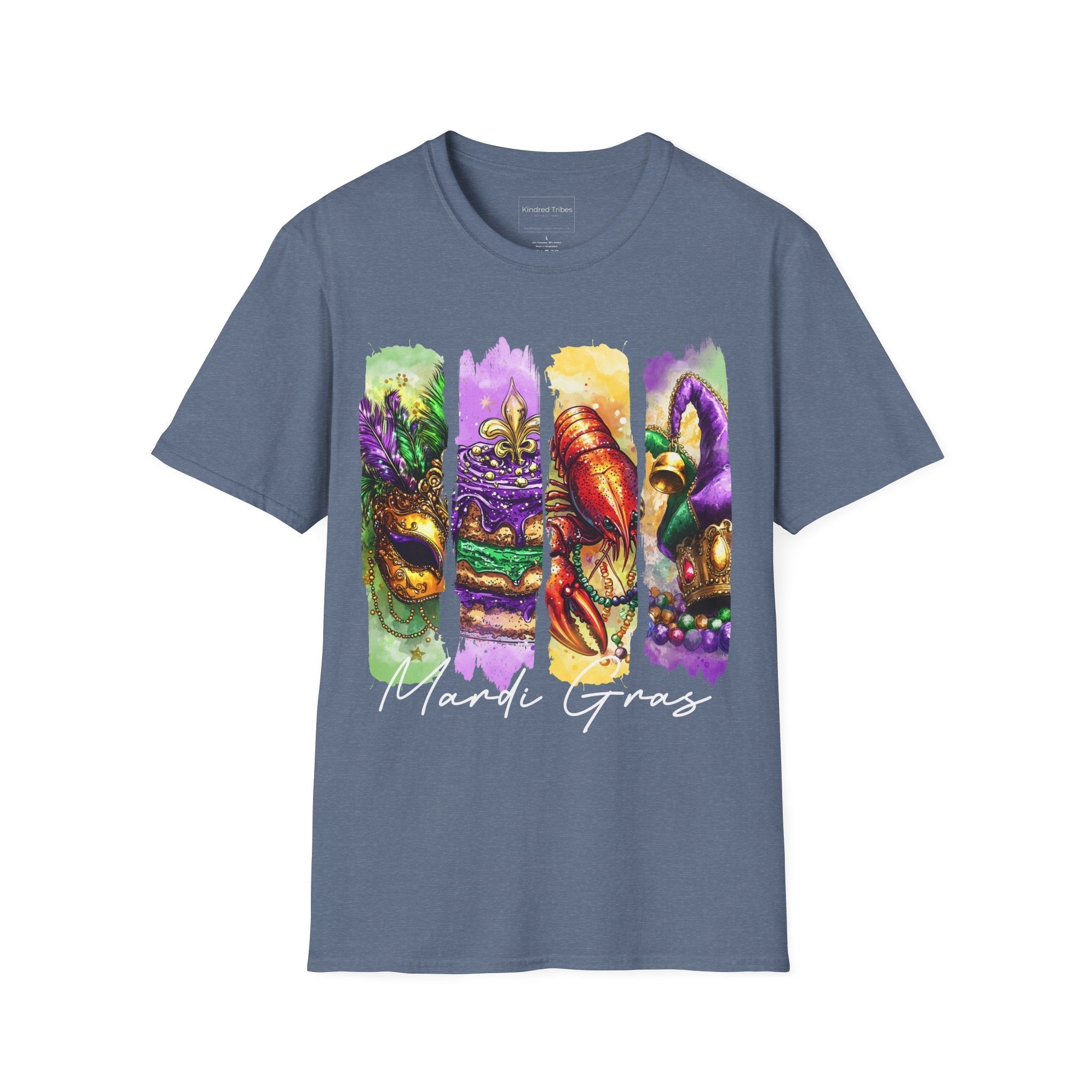 The Ultimate Mardi Gras Tee in Heather Indigo Blue featuring a four-panel vertical graphic celebrating Mardi Gras. The panels, from left to right, depict an ornate golden masquerade mask on a green background, a purple-iced King Cake with a fleur-de-lis on a purple background, a vibrant red crawfish on a yellow background, and a jester's hat with colorful beads on a purple background. Below the panels, 'Mardi Gras' is written in elegant black script.