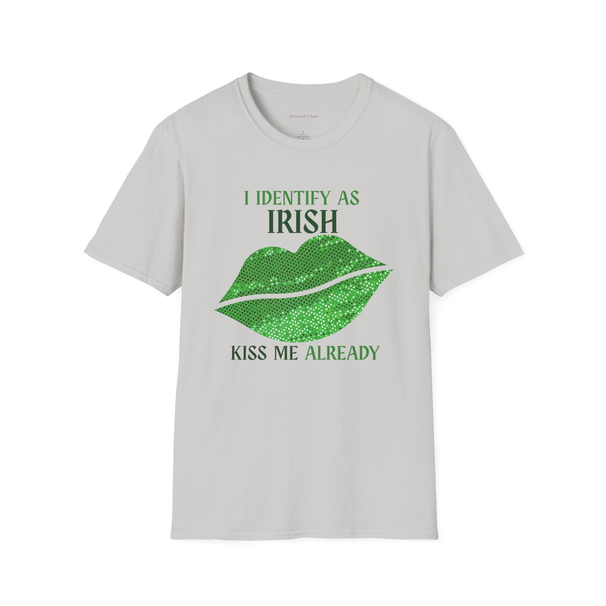 A light grey Identify As Irish T-Shirt featuring the text 'I IDENTIFY AS IRISH' in bold white celtic letters at the top. Below the text is a large pair of lips filled with a sparkling, vibrant green sequin-effect pattern. At the bottom, the phrase 'KISS ME ALREADY' is printed in a matching white font. 