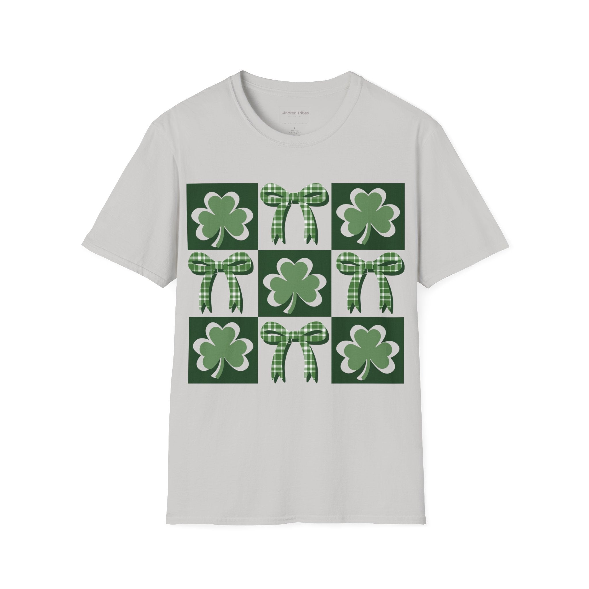 A Ice Grey Lucky Coquette t-shirt featuring a 3x3 square grid graphic. The grid alternates between squares with a solid dark green background containing a lighter green shamrock and squares containing a green-and-white checkered bow. The design is modern, symmetrical, and preppy in style