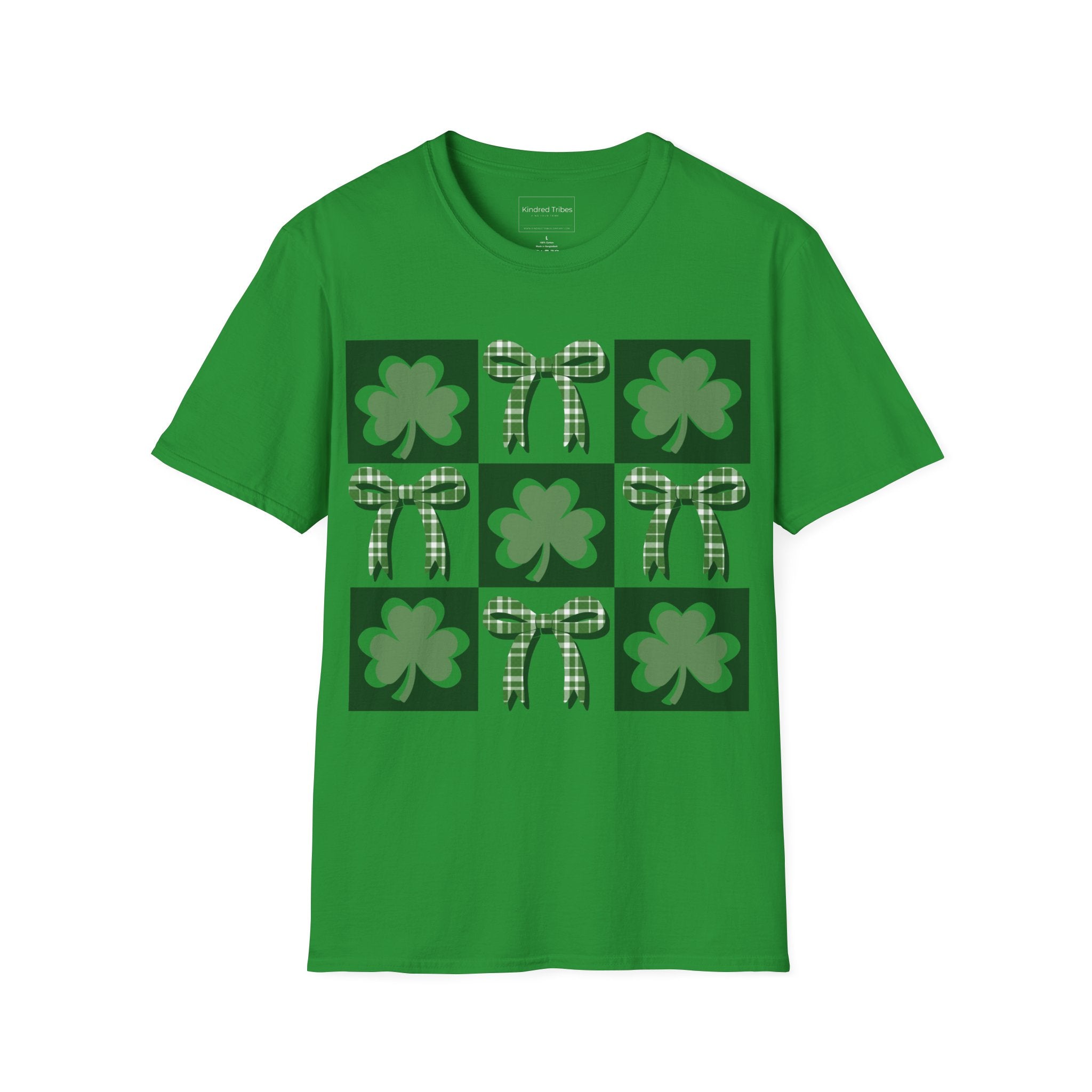 A Irish Green Lucky Coquette t-shirt featuring a 3x3 square grid graphic. The grid alternates between squares with a solid dark green background containing a green shamrock and squares containing a green-and-white checkered bow. The design is modern, symmetrical, and preppy in style