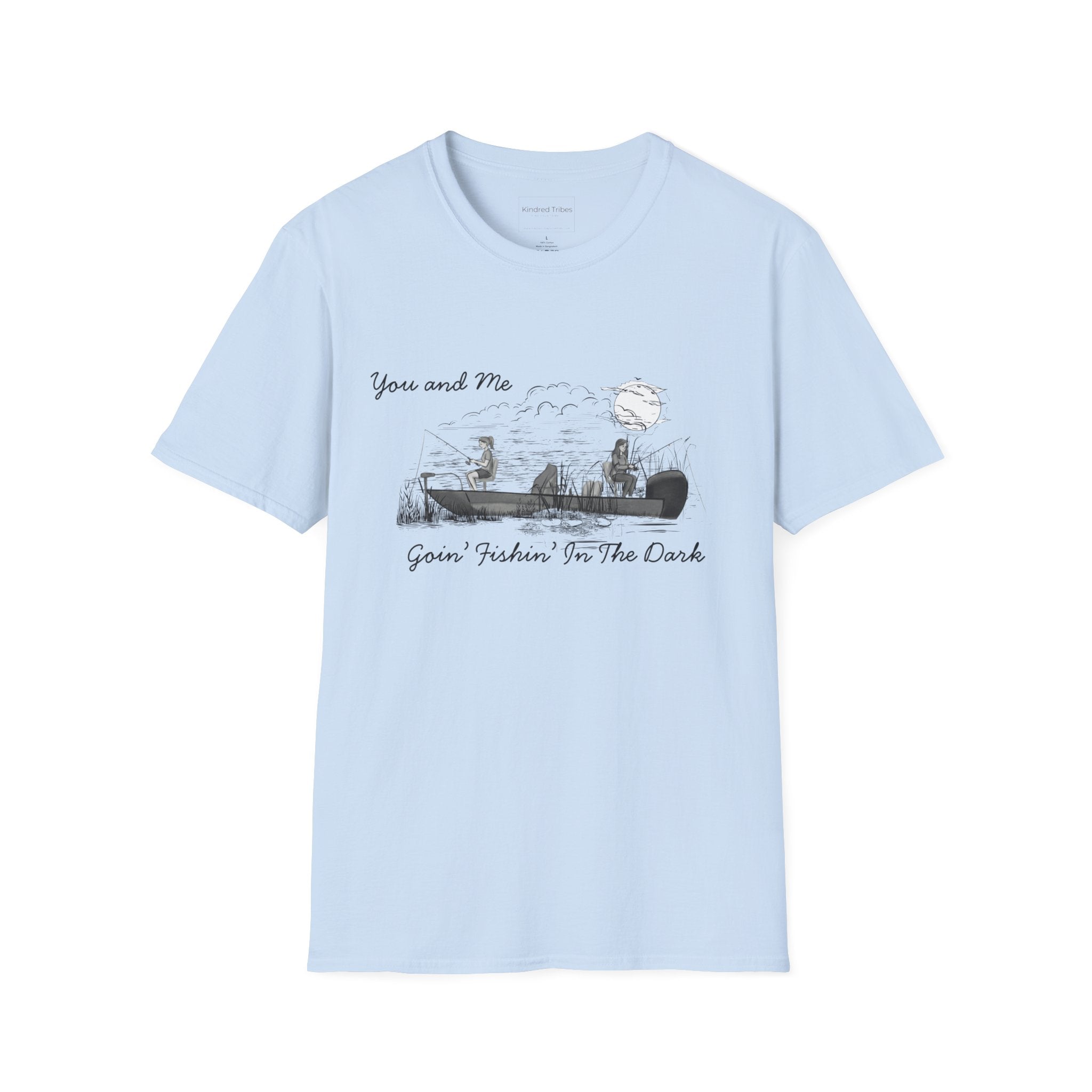 The Best Friends Fishin' In The Dark T-Shirt shows two women in a fishing boat fishing with the moon shining down in a black and white hand sketched print design on a light blue cotton tee.
