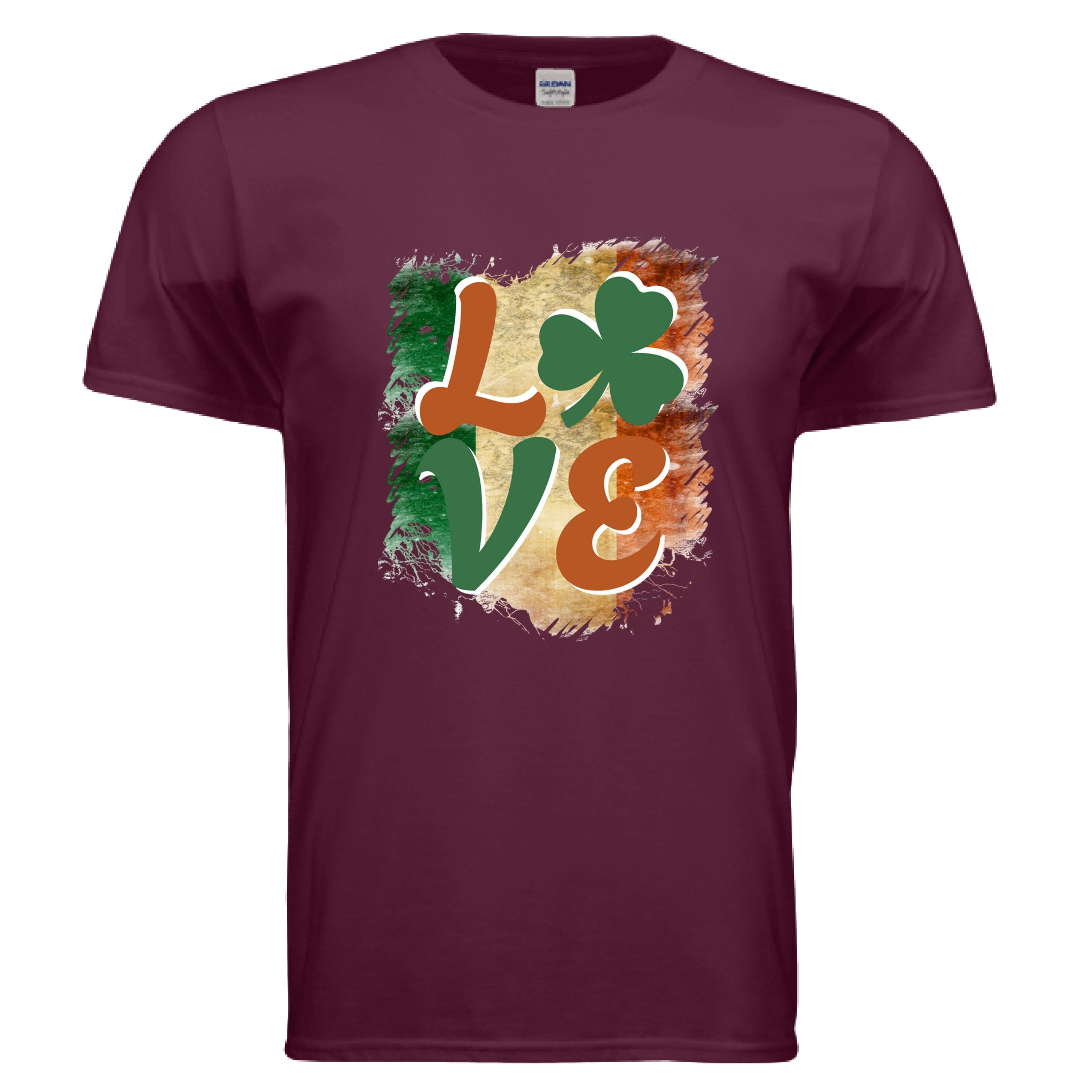 A maroon Celtic Love t-shirt featuring a vintage-style graphic of the word 'LOVE.' The letters 'L,' 'V,' and 'E' are in a stylized, earthy orange and green font. A vibrant green shamrock replaces the letter 'O.' The entire word is set against a distressed, brushstroke-style background representing the green, white, and orange vertical stripes of the Irish flag.