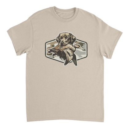 Beige Duck Hunter's T-Shirt featuring a hunting dog holding a duck graphic with camo background.