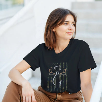Woman wearing black Patriotic Hunting Fishing Faith T-Shirt with American flag and fishing hook design sitting on stairs